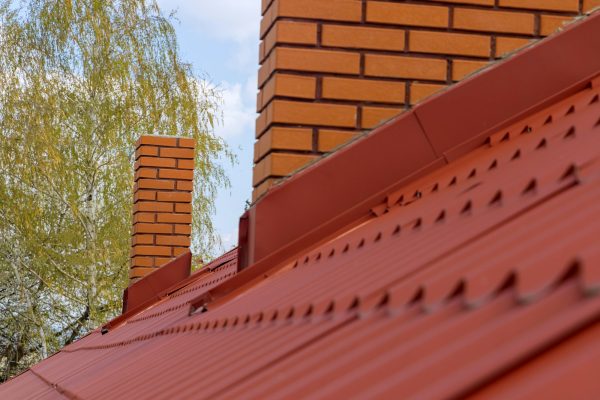 Roof housetop with red roofing tiles